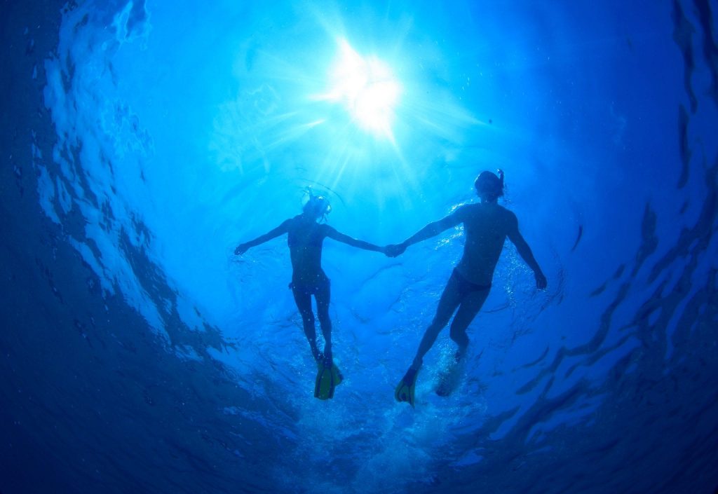 Freedivers swimming in the ocean